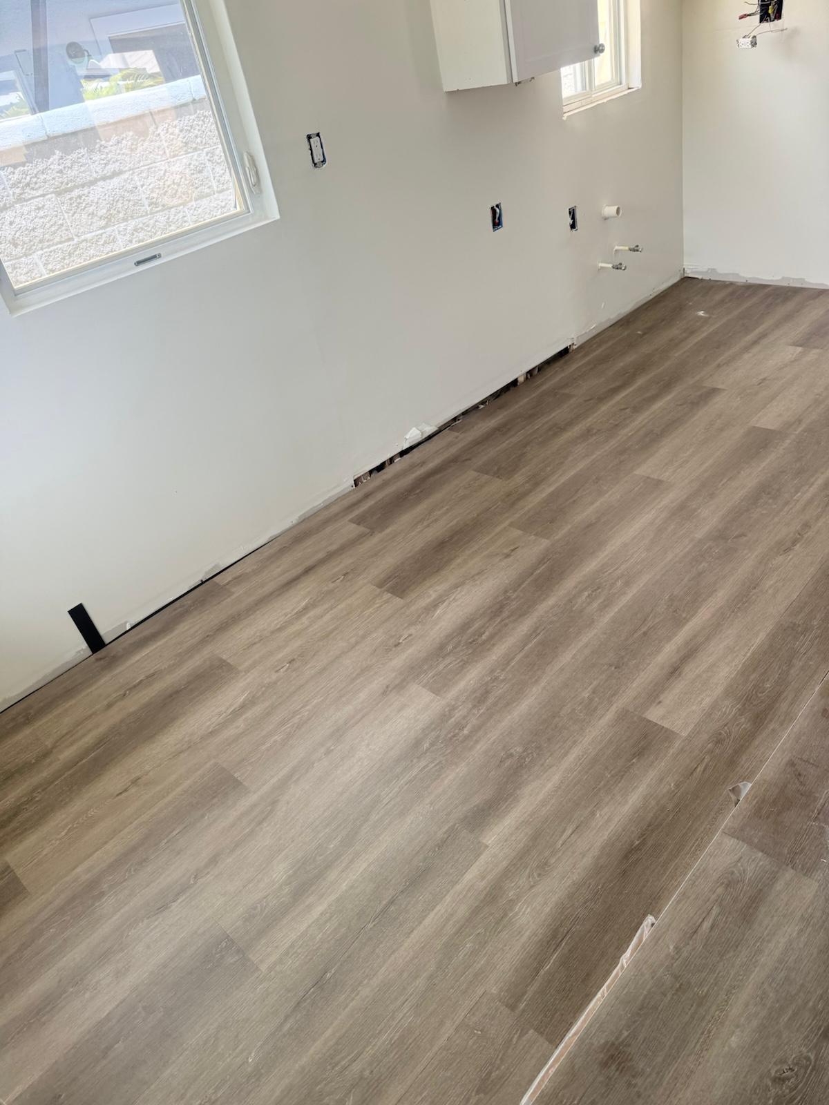 LVP flooring installation by Guzman Reliable Services LLC